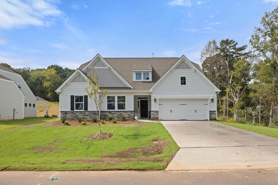 Front exterior of a new home in Grove Park, Clemmons, NC, highlighting curb appeal (Image 2).