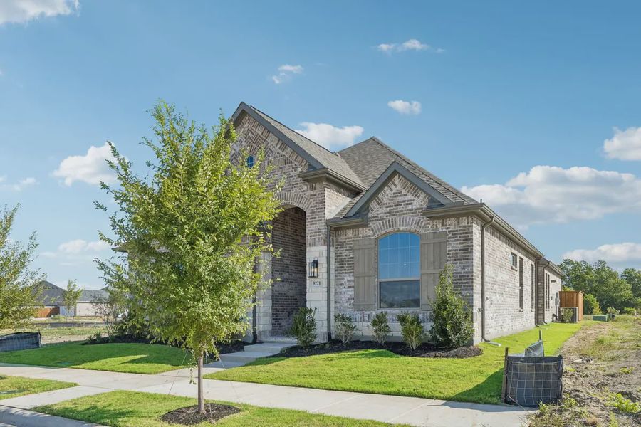 Front exterior of a new home in Talia, Mesquite, TX, highlighting curb appeal (Image 24).