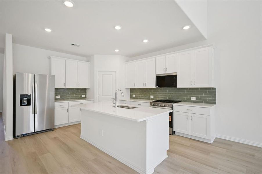 Photo is not of the actual home, but is an inspirational photo of builder’s model home and may depict options, furnishings, and/or decorator features that are not included.