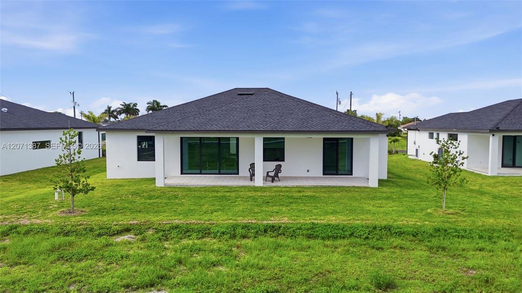 Exterior details and patio area of a home in , Cape Coral (Image 32).