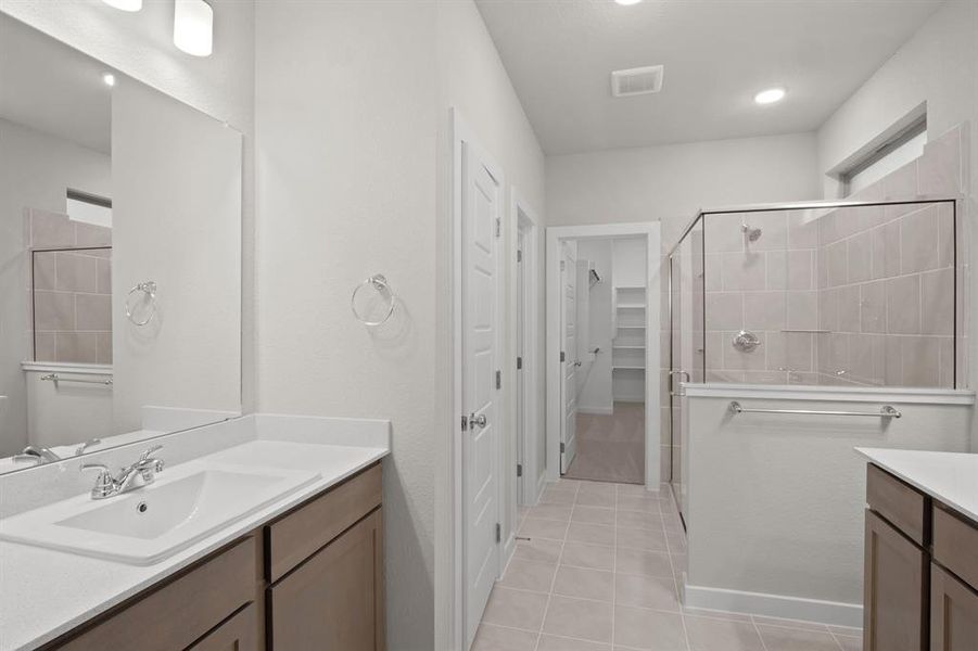 Primary Bathroom in the Willow home plan by Trophy Signature Homes – REPRESENTATIVE PHOTO Primary Bathroom in the Willow home plan by Trophy Signature Homes – REPRESENTATIVE PHOTO