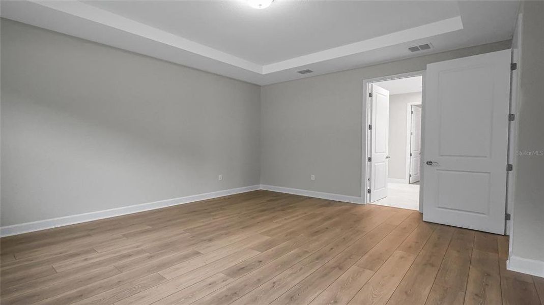 Spacious, unfurnished interior of a new home in Cresswind at Hammock Oaks, Lady Lake (Image 47). Spacious, unfurnished interior of a new home in Cresswind at Hammock Oaks, Lady Lake (Image 47).