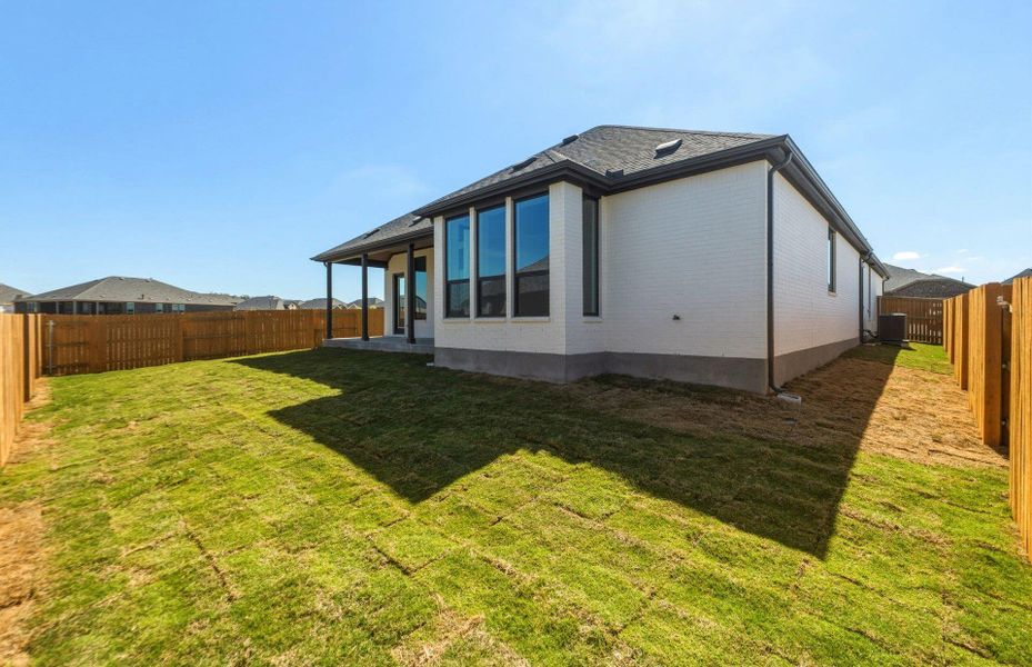 Exterior details and patio area of a home in 6 Creeks, Kyle (Image 23).