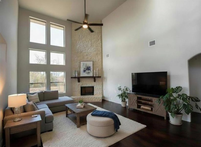 Wall of windows in impressive family room