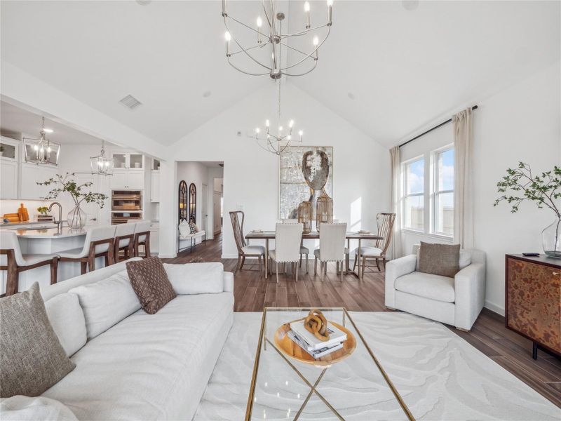 High vaulted ceilings in the great room and dining area High vaulted ceilings in the great room and dining area