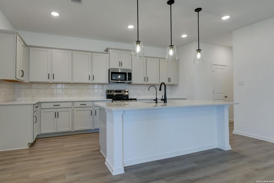 Furnished interior view inside a new home in Hennersby Hollow, San Antonio (Image 4). Furnished interior view inside a new home in Hennersby Hollow, San Antonio (Image 4).