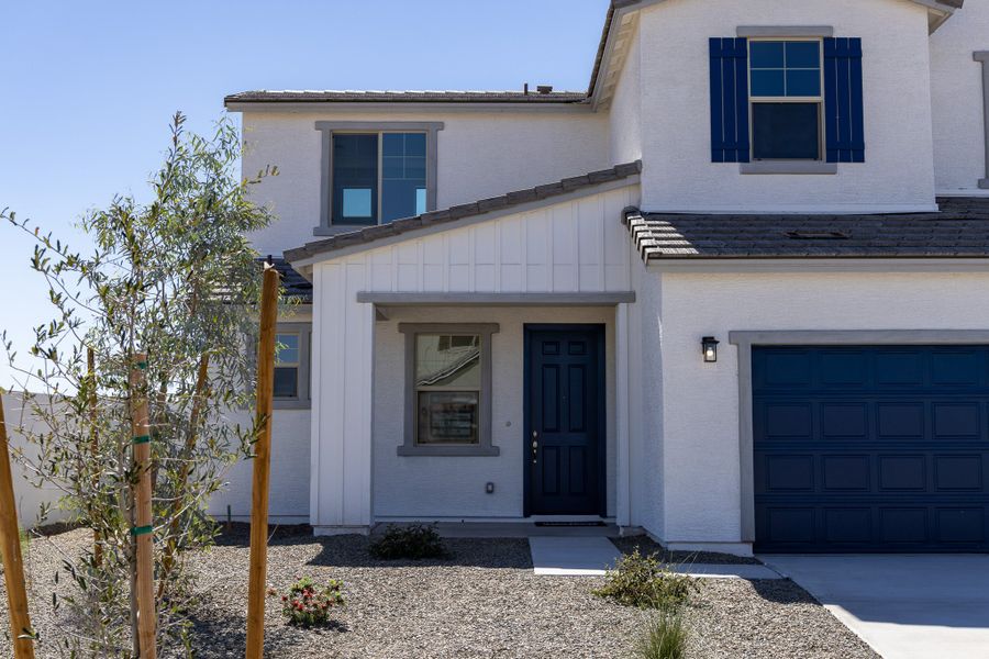 Front exterior of a new home in Rancho Santa Rosa, Maricopa, AZ, highlighting curb appeal (Image 19).