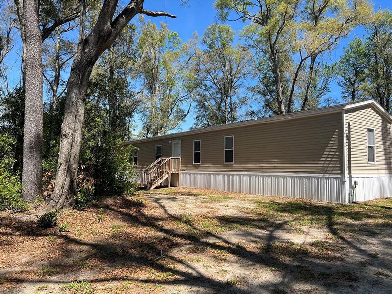 Exterior details and patio area of a home in , Branford (Image 19).