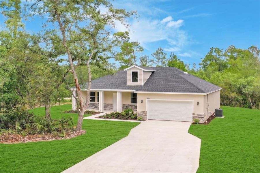Front exterior of a new home in , Eustis, FL, highlighting curb appeal (Image 23).