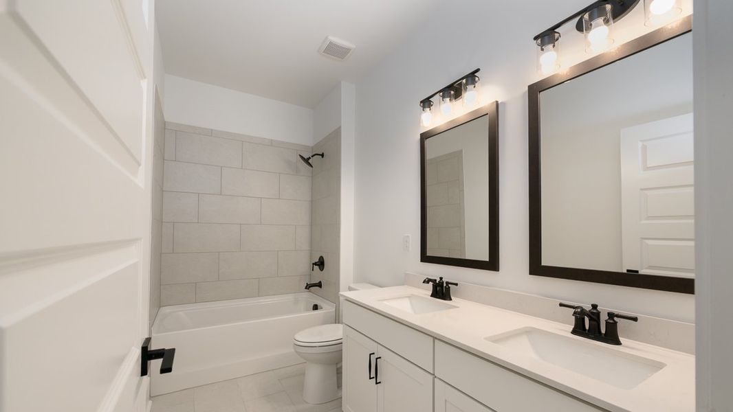 Representative furnished interior of a home built from the Harbor by D.R. Horton in The Village at Sandy Plains, Marietta (Image 8).