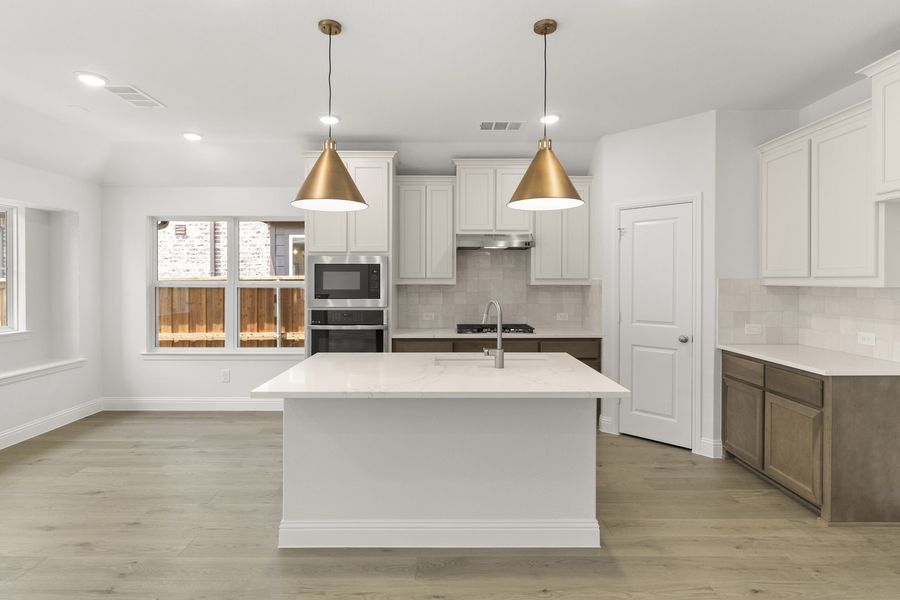 Furnished interior view inside a new home in The Reserve at Spiritas Ranch, Little Elm (Image 7).