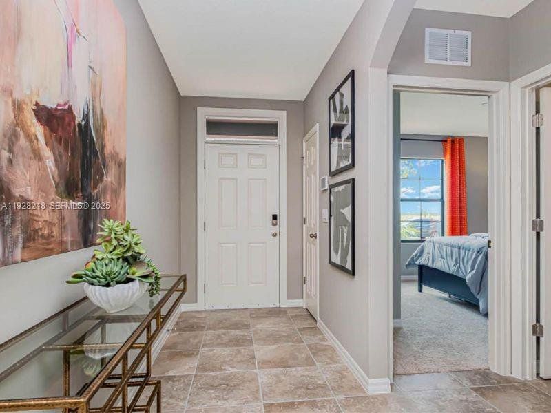 Furnished interior view inside a new home in , Fort Pierce (Image 7). Furnished interior view inside a new home in , Fort Pierce (Image 7).