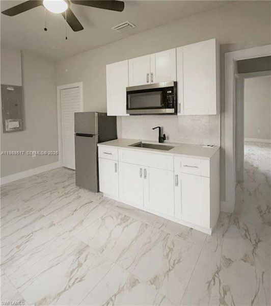 Furnished interior view inside a new home in , Lehigh Acres (Image 7).