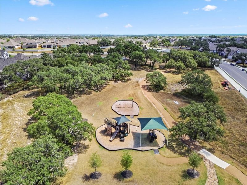 Aerial perspective of suburban area featuring a tree filled landscape Aerial perspective of suburban area featuring a tree filled landscape