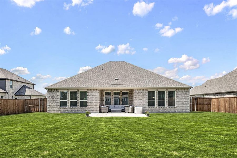 Front exterior of a new home in Lovers Landing, Forney, TX, highlighting curb appeal (Image 21). Front exterior of a new home in Lovers Landing, Forney, TX, highlighting curb appeal (Image 21).