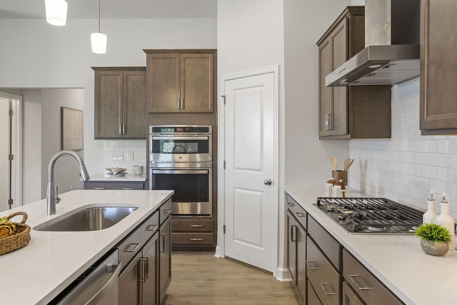Furnished interior view inside a new home in Ovation at Sweetbrier, Durham (Image 8).