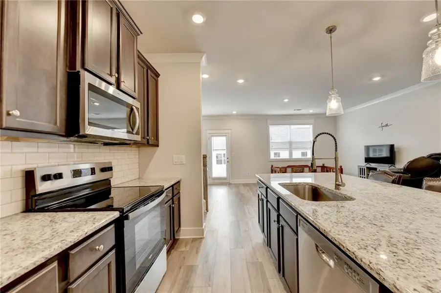 Furnished interior view inside a new home in , Auburn (Image 9).