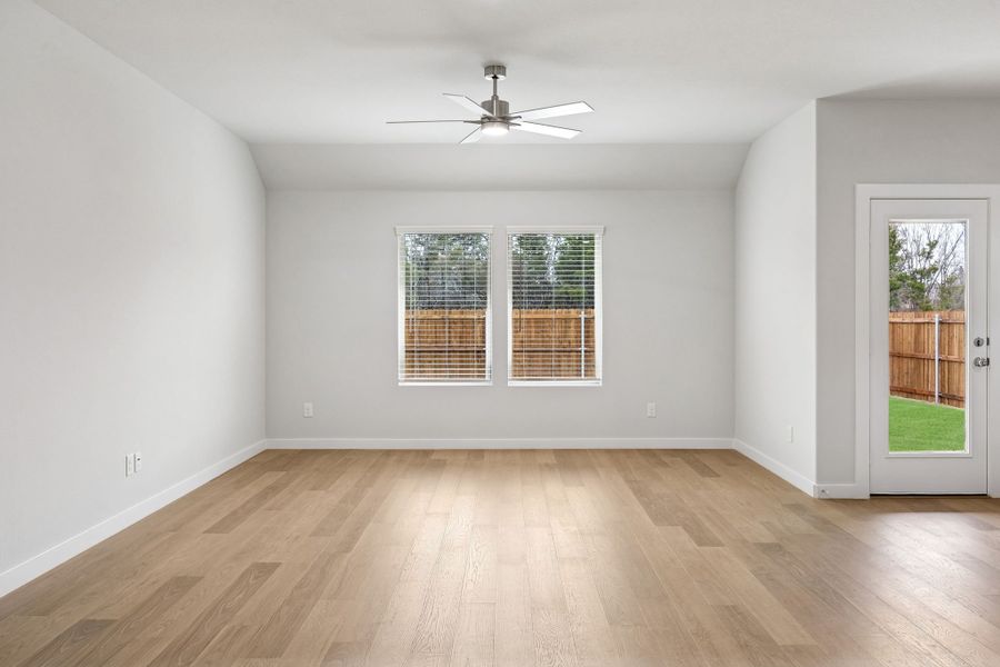 Living Room in the Heisman home plan by Trophy Signature Homes – REPRESENTATIVE PHOTO