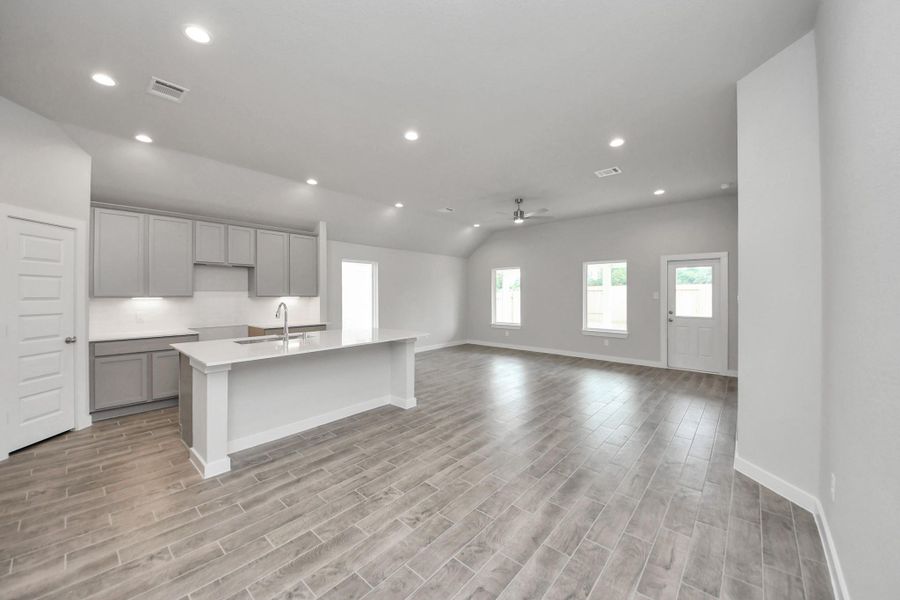 Another perspective of the dining space and kitchen area. Sample photo of completed home with similar floor plan. Actual colors and selections may vary. Another perspective of the dining space and kitchen area. Sample photo of completed home with similar floor plan. Actual colors and selections may vary.