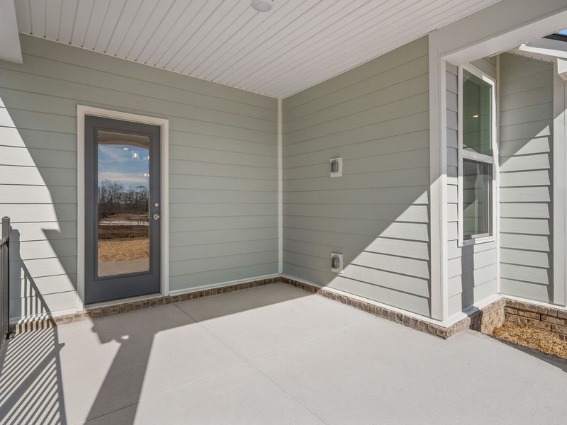 Exterior details and patio area of a home in Woods Crossing, Gallatin (Image 4).