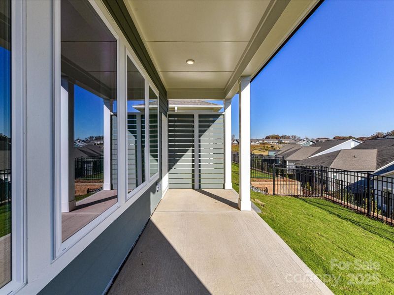Exterior details and patio area of a home in Encore at Streamside - Classic Series, Waxhaw (Image 24).