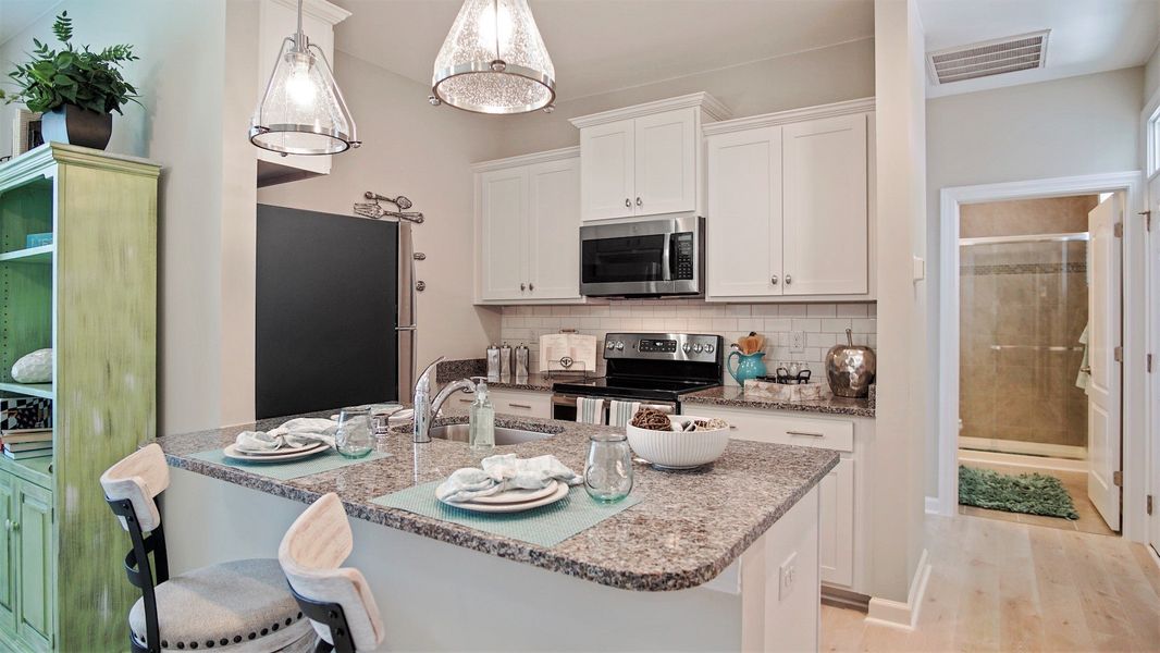 Representative furnished interior of a home built from the The Seashore Multi Gen by Chesapeake Homes in Bridgewater - Shorehaven Village, Little River (Image 8). Representative furnished interior of a home built from the The Seashore Multi Gen by Chesapeake Homes in Bridgewater - Shorehaven Village, Little River (Image 8).