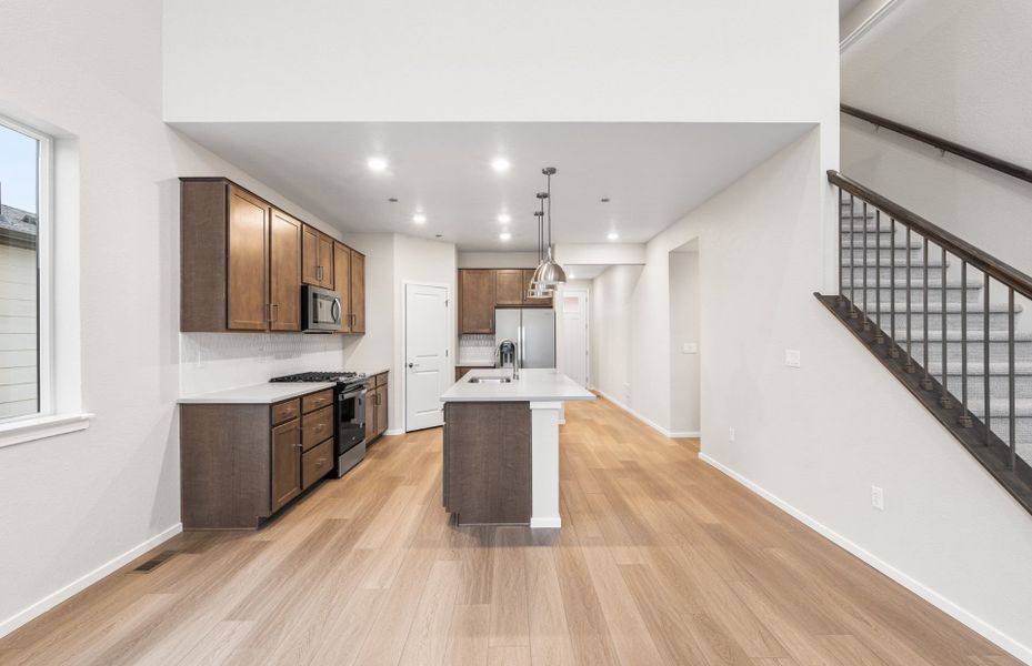 Furnished interior view inside a new home in Harvest Crossing, Aurora (Image 9).