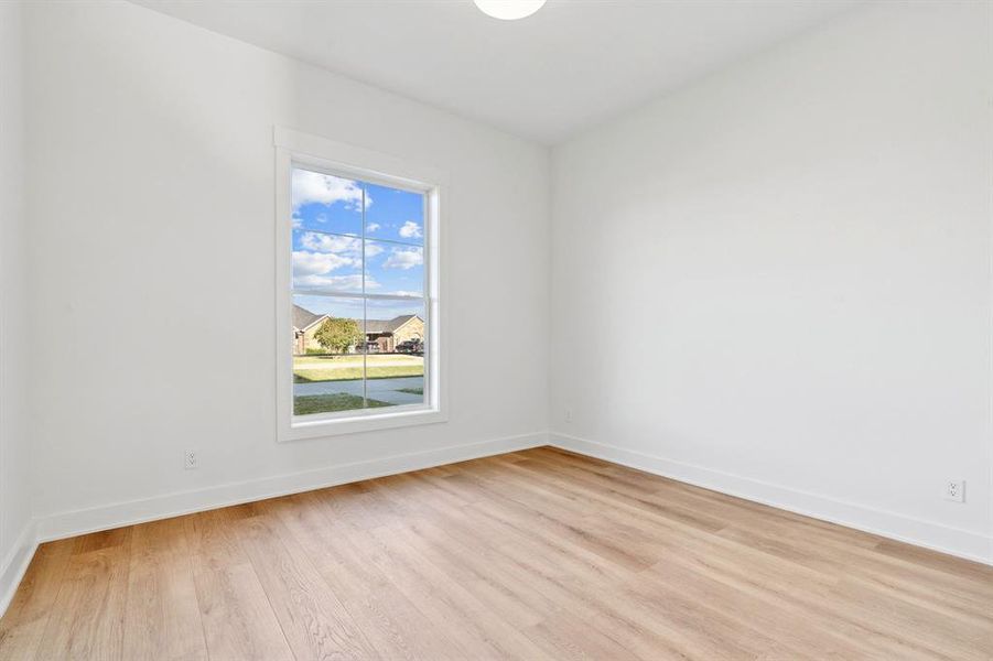 Another bedroom facing front of the home.