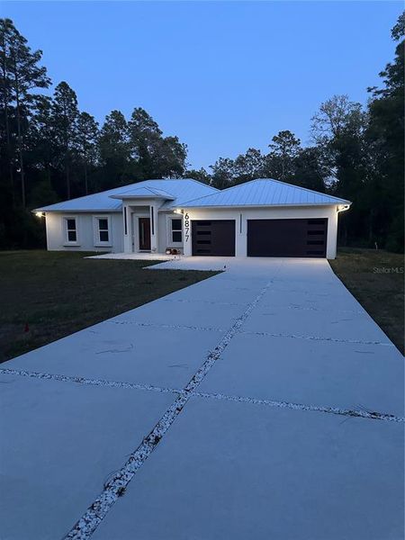 Front exterior of a new home in , Ocala, FL, highlighting curb appeal (Image 19).