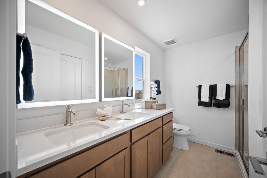 Furnished interior view inside a new home in The Commons at Victory Ridge, Colorado Springs (Image 12).