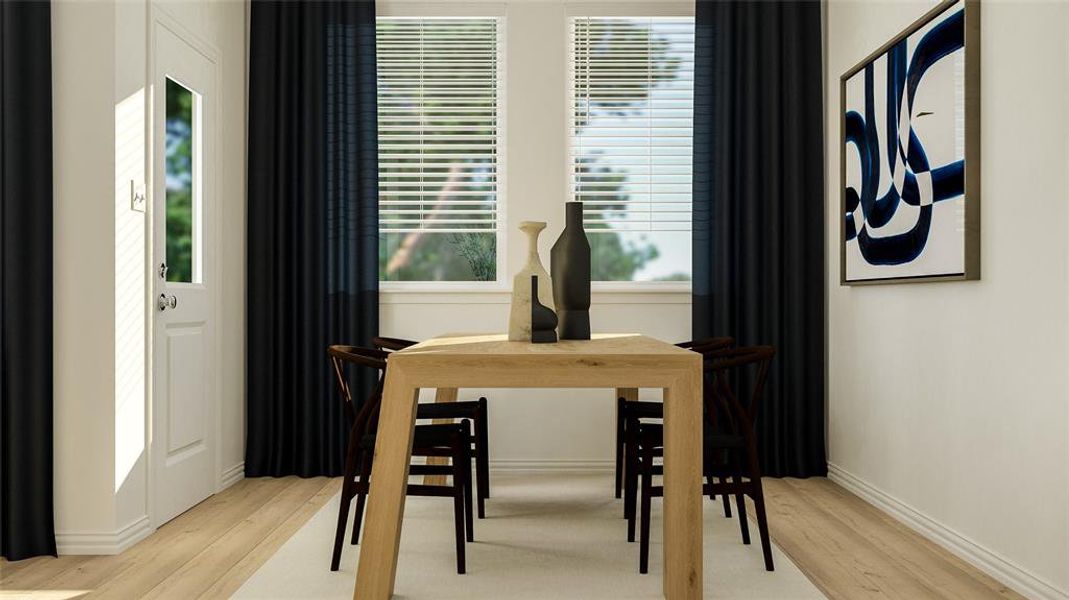 Dining area featuring light wood-type flooring and a healthy amount of sunlight