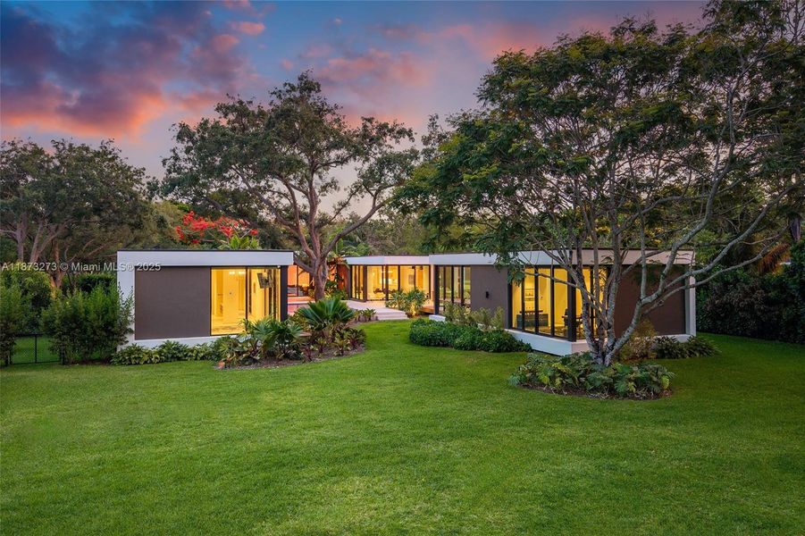 Front exterior of a new home in , Pinecrest, FL, highlighting curb appeal (Image 22).