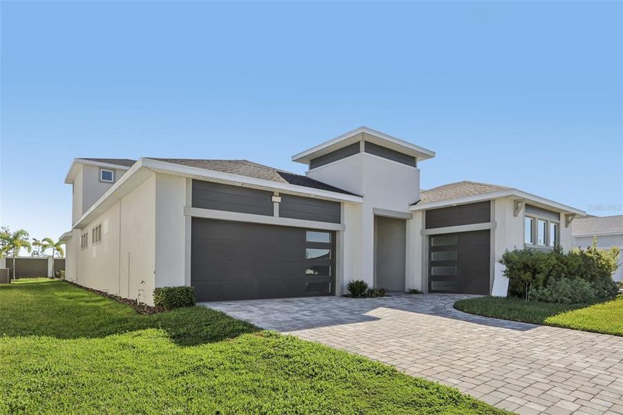 Front exterior of a new home in Eagles Cove at Mirada, San Antonio, FL, highlighting curb appeal (Image 1).