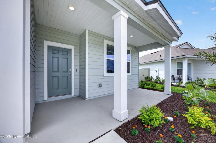 Exterior details and patio area of a home in Entrada, St. Augustine (Image 3).