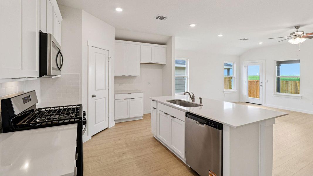 Furnished interior view inside a new home in Monarch Ranch, Manor (Image 7).