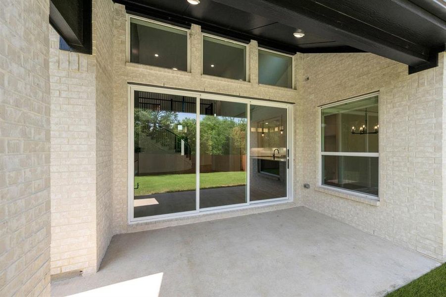 Exterior details and patio area of a home in Birdsong, Mansfield (Image 4). Exterior details and patio area of a home in Birdsong, Mansfield (Image 4).