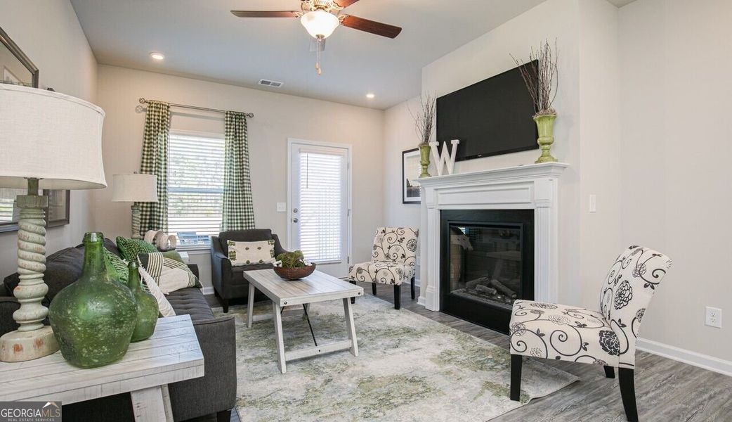 Furnished interior view inside a new home in The Cottages of Silvertown, Thomaston (Image 9).