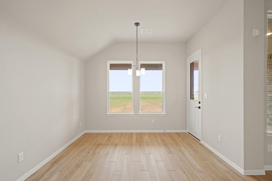 Sun-lit dining area (*Photo not of actual home and used for illustration purposes only.)