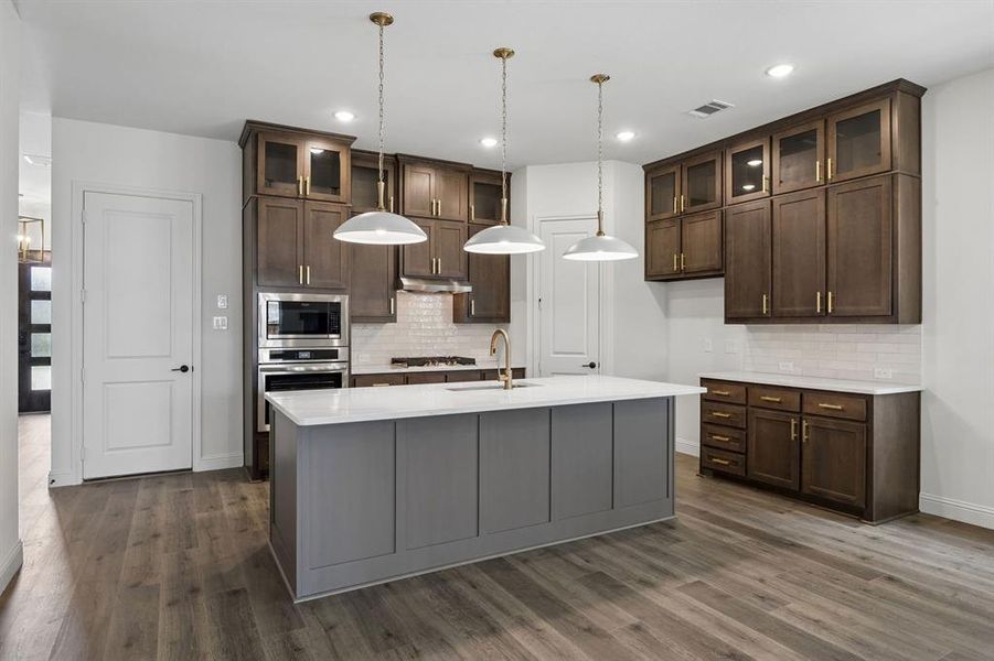 Furnished interior view inside a new home in Country Lakes, Denton (Image 9).