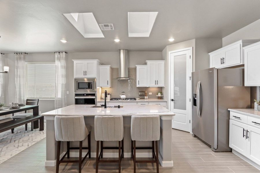 Representative furnished interior of a home built from the Pershing by Hakes Brothers in Paseo Del Este, El Paso (Image 16).