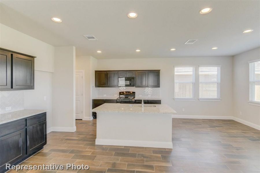 Representative furnished interior of a home built from the Harvest Ridge 1782 by Brohn Homes in Harvest Ridge, Elgin (Image 5).