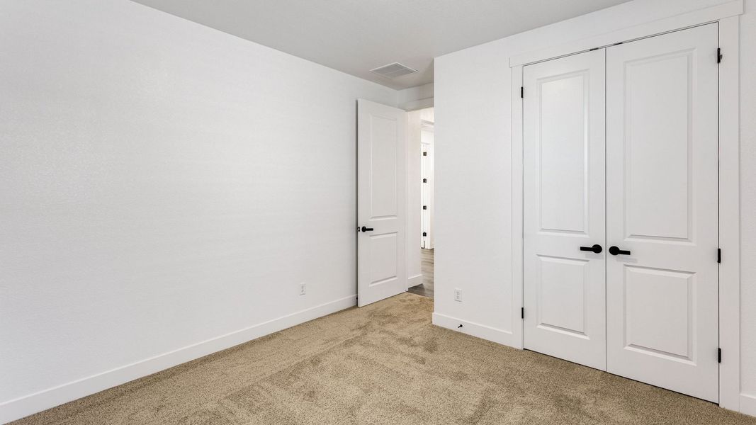 Representative unfurnished interior of a home built from the Grover by D.R. Horton in Vantage, Berthoud (Image 18).