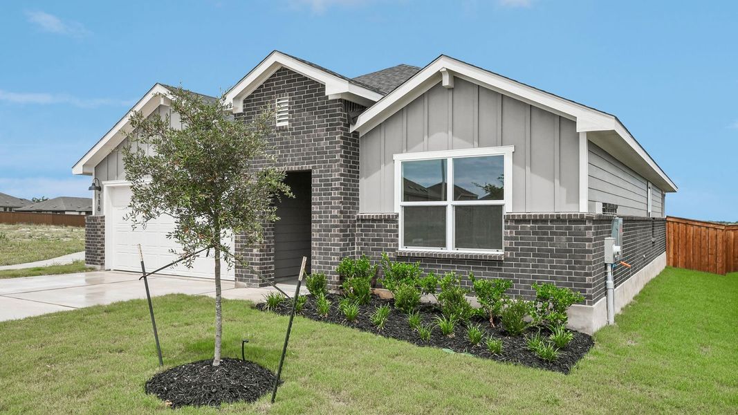 Front exterior of a new home in Thunder Rock, Marble Falls, TX, highlighting curb appeal (Image 2).