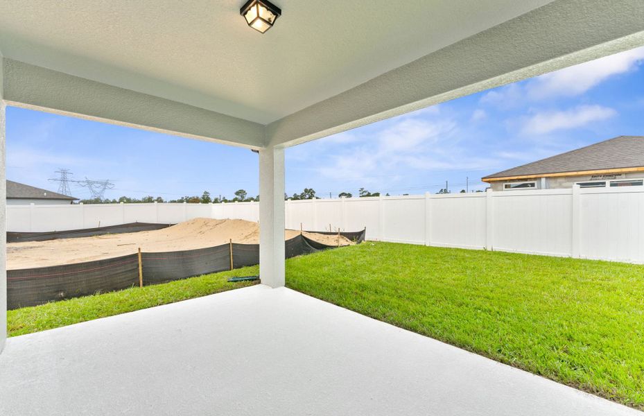 Exterior details and patio area of a home in Caldera, Spring Hill (Image 3).