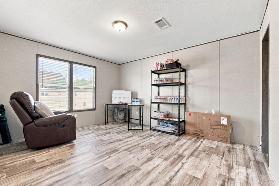 Furnished interior view inside a new home in , Conroe (Image 17).