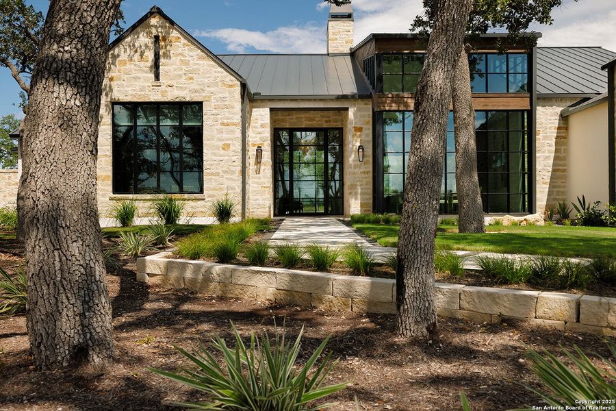 Front exterior of a new home in , Boerne, TX, highlighting curb appeal (Image 1).