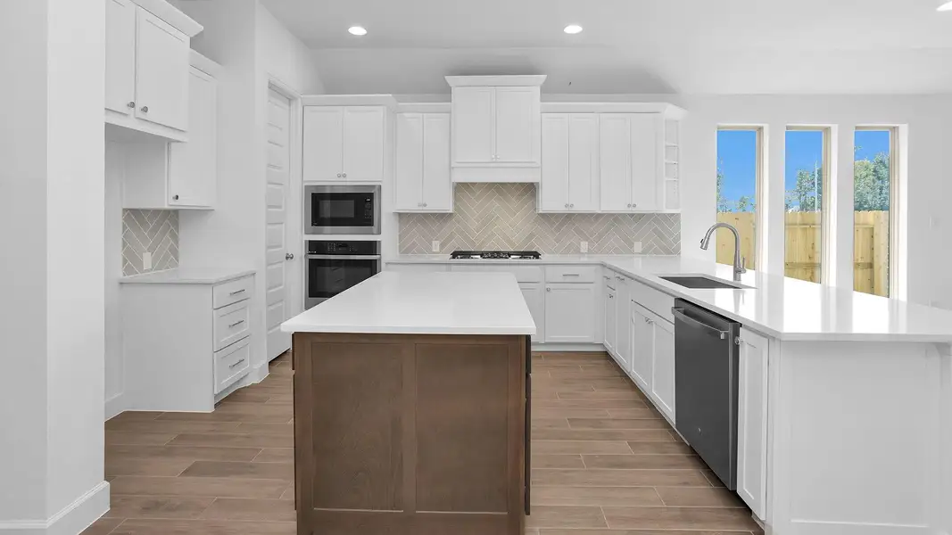 Furnished interior view inside a new home in Grand Central Park 45', Conroe (Image 7).