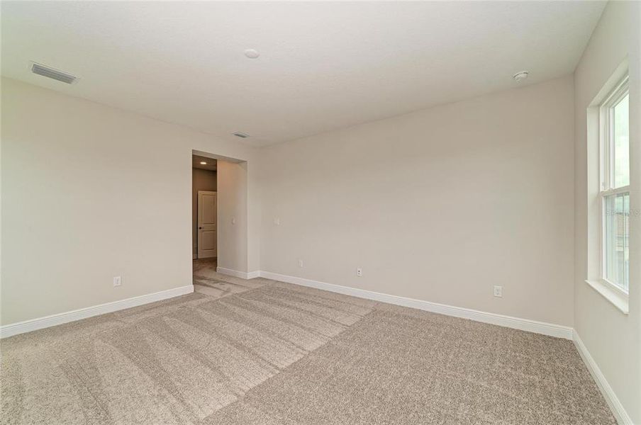 Spacious, unfurnished interior of a new home in North River Ranch, Parrish (Image 44).