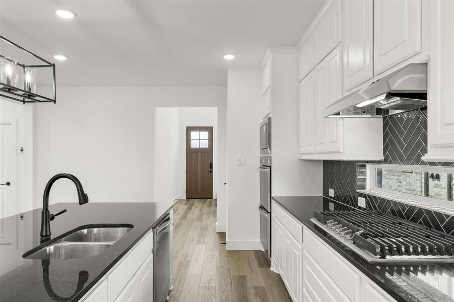 Furnished interior view inside a new home in The Villages of Hurricane Creek, Anna (Image 13). Furnished interior view inside a new home in The Villages of Hurricane Creek, Anna (Image 13).