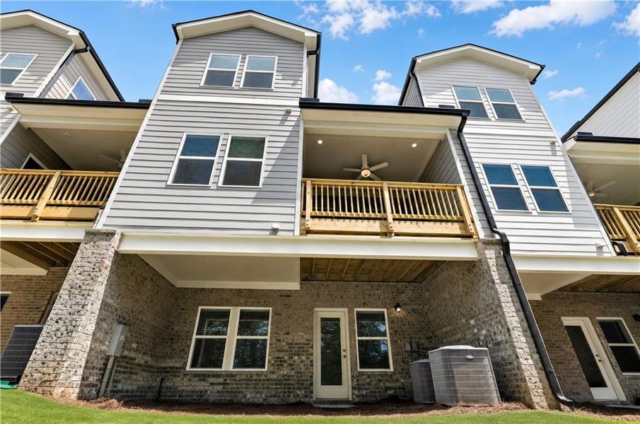 Exterior details and patio area of a home in Forrest Crossing, Woodstock (Image 3). Exterior details and patio area of a home in Forrest Crossing, Woodstock (Image 3).